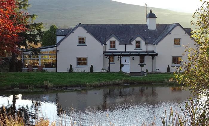 Llwyn Onn Guest House is situated over looking our lake where you will find a small seating area in the warmer months to enjoy the lake as much as our